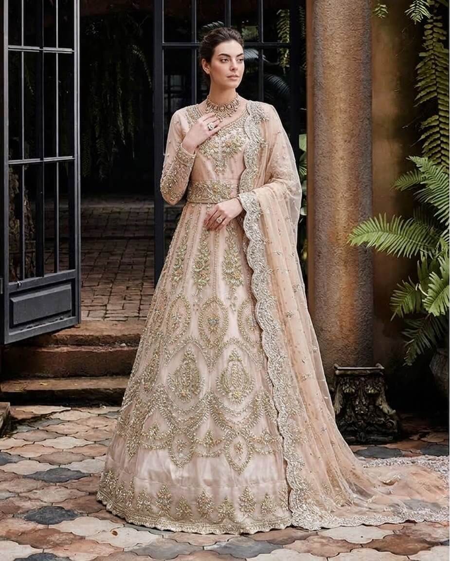 Champagne wedding formal with silver-gold hand embroidery and matching dupatta by Maysoon